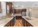 Gourmet kitchen with stainless steel appliances, granite countertops, and tile backsplash at 11421 Quiet Forest Dr, Tampa, FL 33635