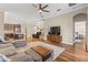 Bright, open living space showcasing the kitchen, dining area, and a cozy living room setup at 11421 Quiet Forest Dr, Tampa, FL 33635