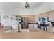 Bright kitchen featuring stainless steel appliances, light wood cabinets, and a spacious countertop with a sink at 14247 Spanish Wells Dr, Hudson, FL 34667