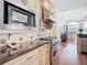Well-equipped kitchen featuring stainless steel appliances and granite countertops at 18111 Diamond Cove Ct, Tampa, FL 33647