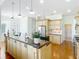 Bright, open kitchen with stainless steel appliances, custom cabinetry, and plenty of counter space at 18111 Diamond Cove Ct, Tampa, FL 33647