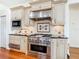 The kitchen features stainless steel appliances and granite countertops at 18111 Diamond Cove Ct, Tampa, FL 33647