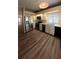 This kitchen offers stainless appliances and lots of room for a dining table in front of a bright window at 1822 Lake Cypress Dr # 1822, Safety Harbor, FL 34695