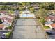 Aerial shot showcasing community pool, tennis courts, and surrounding residential area at 1881 N Hercules Ave # 1205, Clearwater, FL 33765