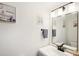 Bright and modern bathroom featuring a vanity with a large mirror and updated fixtures at 1881 N Hercules Ave # 1205, Clearwater, FL 33765