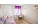 Charming bedroom featuring whimsical decor, a cozy bed, and a functional study area at 1881 N Hercules Ave # 1205, Clearwater, FL 33765