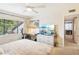 Serene primary bedroom with an airy ambiance, a large window, and a modern workspace at 1881 N Hercules Ave # 1205, Clearwater, FL 33765