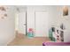 Bright bedroom with closet and doorway, perfect for a room or guest space at 1881 N Hercules Ave # 1205, Clearwater, FL 33765
