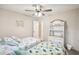 Comfortable bedroom with twin beds, neutral walls, and closet access at 2022 Heathfield Cir, Sun City Center, FL 33573