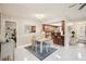 This dining area features tile floors and flows into the kitchen area, perfect for entertaining guests at 2022 Heathfield Cir, Sun City Center, FL 33573