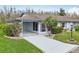 Inviting single-story home with a carport, neat landscaping, and a freshly painted exterior at 2022 Heathfield Cir, Sun City Center, FL 33573