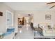 Spacious living area with views of the dining room and kitchen; perfect for entertaining at 2022 Heathfield Cir, Sun City Center, FL 33573