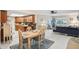 Open concept living space features a dining area, kitchen, and living room perfect for entertaining at 2022 Heathfield Cir, Sun City Center, FL 33573