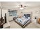 This primary bedroom offers natural light, carpet floors, and a spacious layout at 2022 Heathfield Cir, Sun City Center, FL 33573