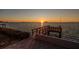 Beautiful sunset view from the private dock, offering a serene waterfront experience at 2240 Harbor View Dr, Dunedin, FL 34698