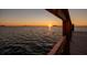 Water view from pier at sunset at 2240 Harbor View Dr, Dunedin, FL 34698