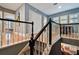 Hallway featuring staircase and stylish design at 2902 Bayshore Vista Dr, Tampa, FL 33611