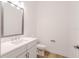 Bathroom with a mirror and a toilet at 3025 Bermuda Sloop Cir, Ruskin, FL 33570