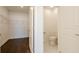 Bathroom has a lavatory and toilet, with a walk-in closet at 3025 Bermuda Sloop Cir, Ruskin, FL 33570