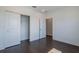 Cozy bedroom with a closet and neutral tones, perfect for relaxation and rest at 3025 Bermuda Sloop Cir, Ruskin, FL 33570