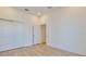 Bright bedroom features wood-look flooring and a closet at 3025 Bermuda Sloop Cir, Ruskin, FL 33570
