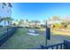 Community dog park with seating, shade trees, and waste disposal station at 3025 Bermuda Sloop Cir, Ruskin, FL 33570