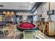 Fun game room with a poker table, a bar area with kitchenette, and stylish decor for residents at 3025 Bermuda Sloop Cir, Ruskin, FL 33570
