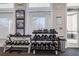 Fitness center with weight rack, dumbbells, kettlebells, and equipment rules sign at 3025 Bermuda Sloop Cir, Ruskin, FL 33570