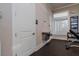 Hallway with a drinking fountain and access to restrooms and workout areas at 3025 Bermuda Sloop Cir, Ruskin, FL 33570