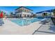 Resort style pool offers ample lounge chairs, providing relaxation and recreation at 3025 Bermuda Sloop Cir, Ruskin, FL 33570