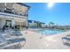 Luxurious pool area features comfortable lounge chairs, offering relaxation and leisure at 3025 Bermuda Sloop Cir, Ruskin, FL 33570