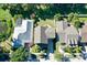 Aerial view of the home showing lush landscaping and surrounding neighborhood at 310 Manns Harbor Dr, Apollo Beach, FL 33572