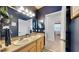 Stylish bathroom boasts a double vanity with ample counter space and tastefully chosen decor, creating a serene atmosphere at 310 Manns Harbor Dr, Apollo Beach, FL 33572
