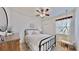 Bedroom with rustic accents and a decorative swing at 310 Manns Harbor Dr, Apollo Beach, FL 33572
