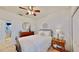 Bedroom with rustic accents, clean white walls and decor at 310 Manns Harbor Dr, Apollo Beach, FL 33572