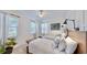 Bedroom with bright natural light and two beds at 310 Manns Harbor Dr, Apollo Beach, FL 33572