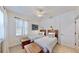 Bedroom with bright natural light and two beds at 310 Manns Harbor Dr, Apollo Beach, FL 33572