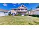 Spacious lawn with screened lanai and backyard patio at 310 Manns Harbor Dr, Apollo Beach, FL 33572