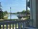 Relaxing water view from the porch, highlighting a scenic lake or canal with a clear view and serene surroundings at 310 Manns Harbor Dr, Apollo Beach, FL 33572
