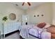 Bedroom featuring a bed, engineered wood floors, and dresser at 3537 Valencia Cove Court, Land O Lakes, FL 34639