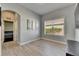 Flex room with tile floors and a window with a view to the front yard and street at 3537 Valencia Cove Court, Land O Lakes, FL 34639