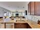 Well-appointed kitchen with granite countertops, stainless steel appliances, and an open layout perfect for entertaining guests at 3537 Valencia Cove Court, Land O Lakes, FL 34639