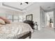 Well-lit bedroom featuring a ceiling fan, providing a comfortable and inviting space at 3605 E Tampa Cir, Tampa, FL 33629