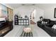 Large living room with a modern fireplace, plush seating, and stylish decor at 3605 E Tampa Cir, Tampa, FL 33629