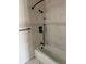 This bathroom features a tiled shower and modern fixtures, perfect for relaxation at 3800 Belle Vista E Dr, St Pete Beach, FL 33706