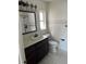 This bathroom features a sink vanity, offering storage and style at 3800 Belle Vista E Dr, St Pete Beach, FL 33706