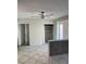The bedroom offers an ample closet and neutral tile, creating a serene retreat at 3800 Belle Vista E Dr, St Pete Beach, FL 33706