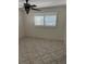 This bedroom is designed with tiled floor and shuttered window, offering modern comfort at 3800 Belle Vista E Dr, St Pete Beach, FL 33706
