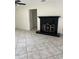 Living room featuring tile flooring and a black mantelpiece at 3800 Belle Vista E Dr, St Pete Beach, FL 33706