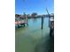 Waterfront view with private dock ready for boating, offering convenient water access at 3800 Belle Vista E Dr, St Pete Beach, FL 33706